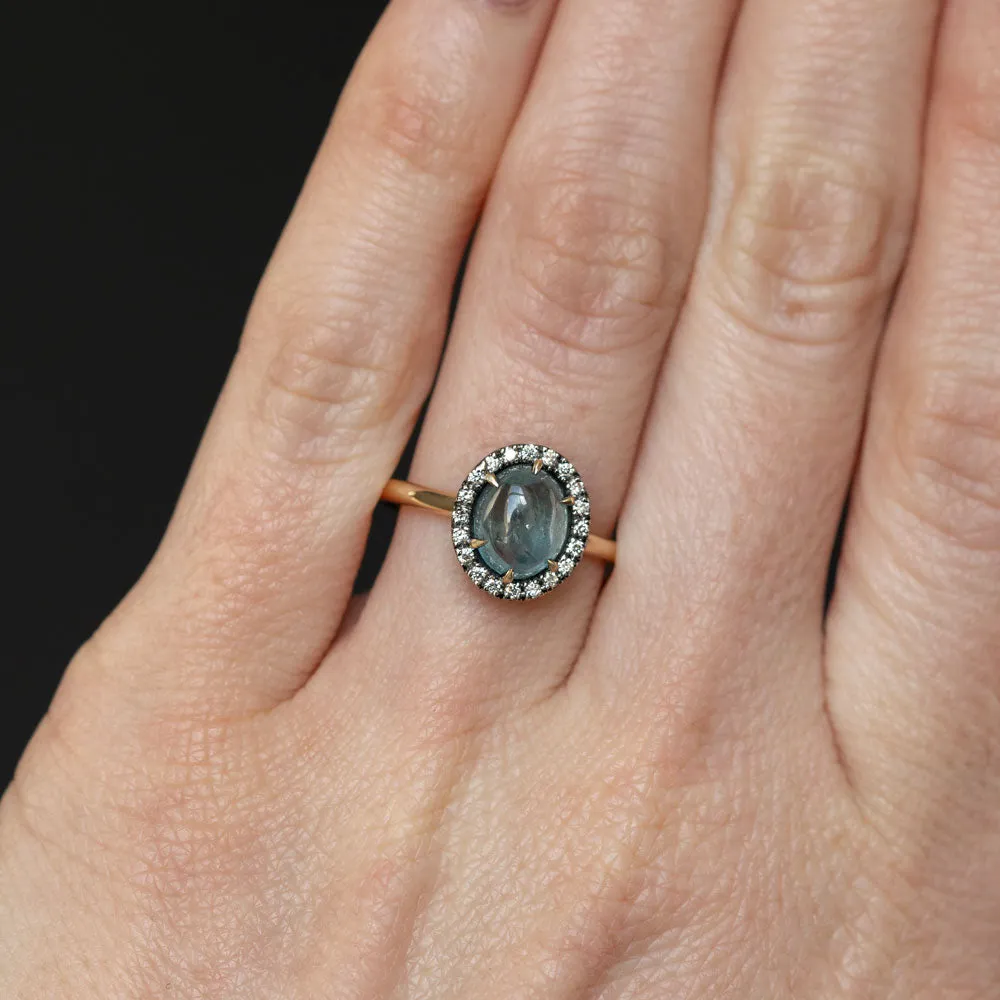 2.40ct Oval Cabochon Montana Sapphire and Antiqued Six Prong Low Profile Halo Ring in 14k Yellow Gold