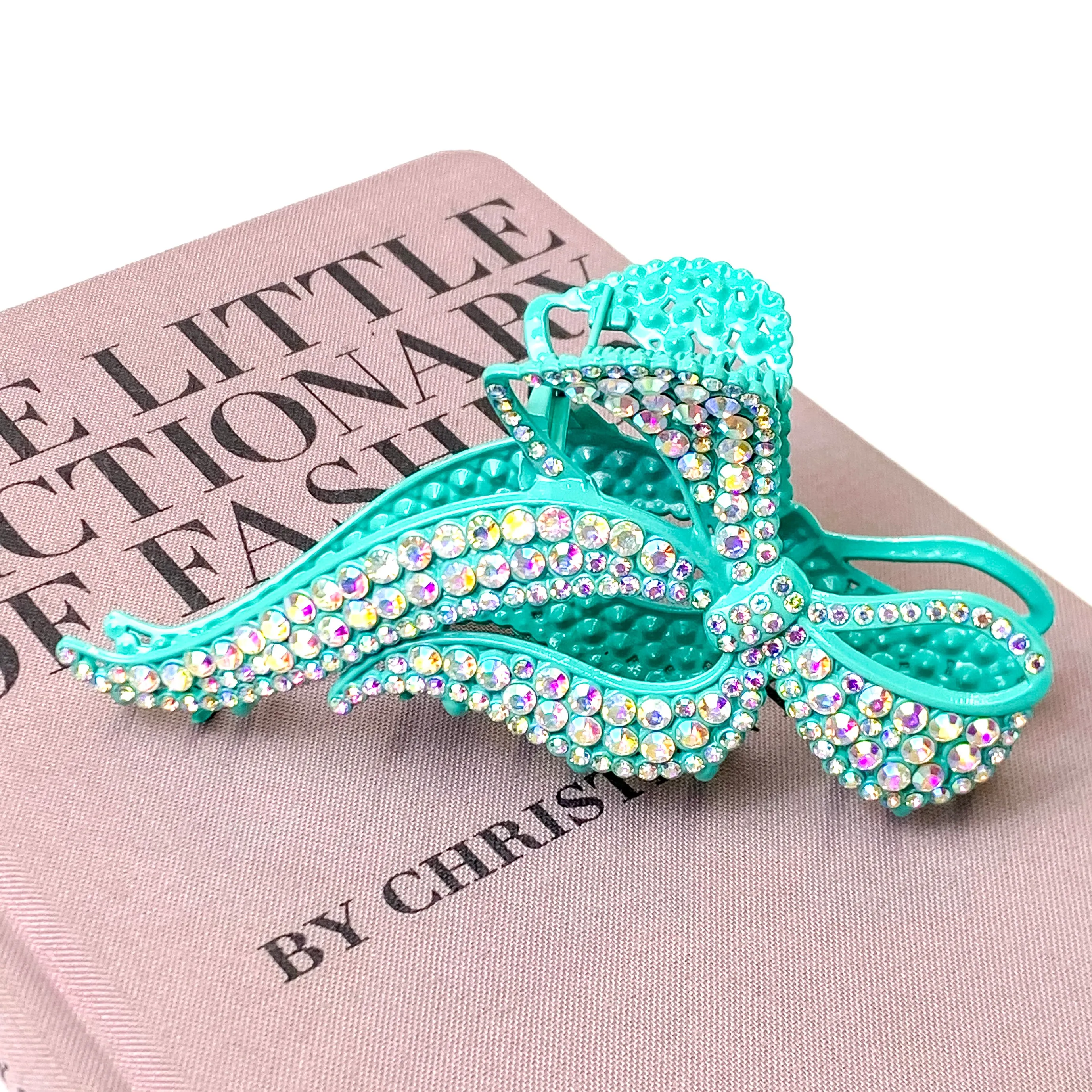 AB Crystal Embellished Bow Shaped Metal Hair Clip in Turquoise Blue