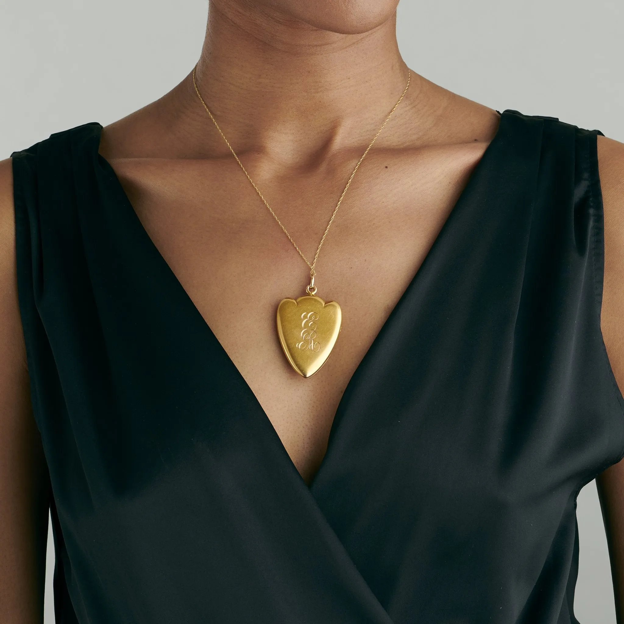 Alling & Co. Heart-Shaped Gold and Enamel Locket