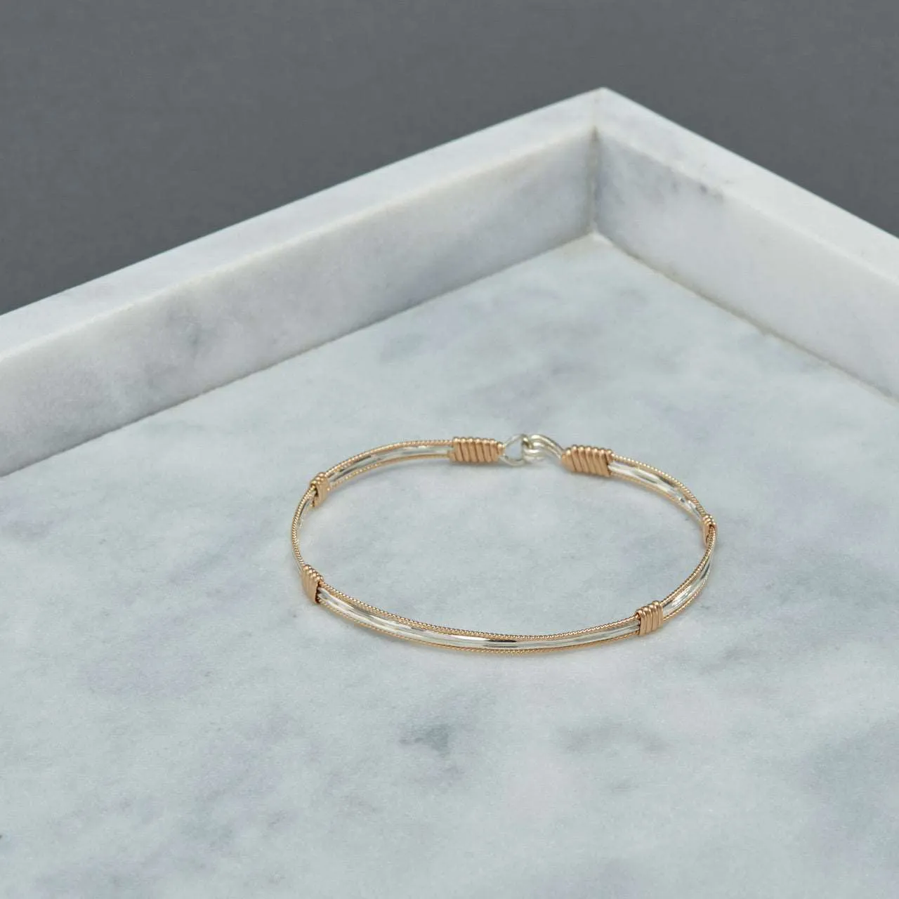 Sure! How about Luxurious 14K Gold and Sterling Silver Be the Light Bracelet?