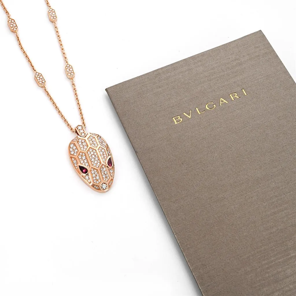 Exquisite Bulgari Serpenti Necklace with Stunning Rubellite Eyes in Elegant Rose Gold