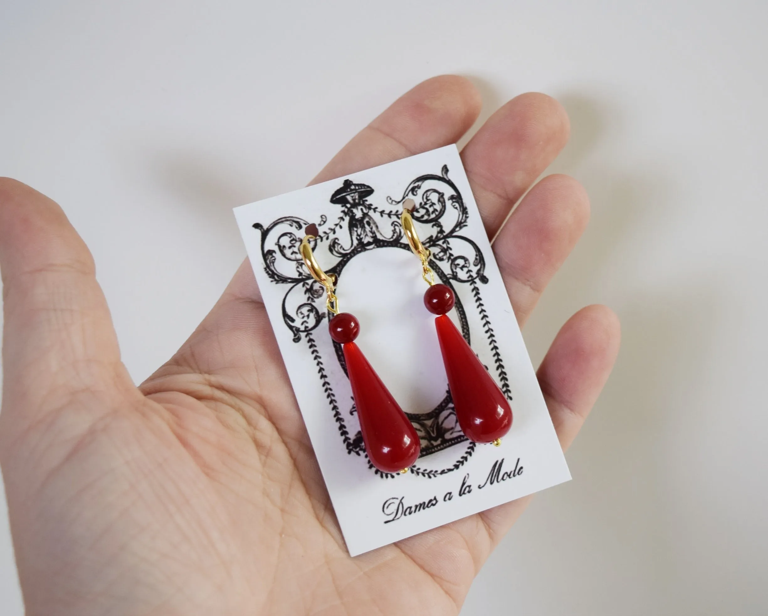 Elegant Coral Red Teardrop Earrings with Dual-Stone Design
