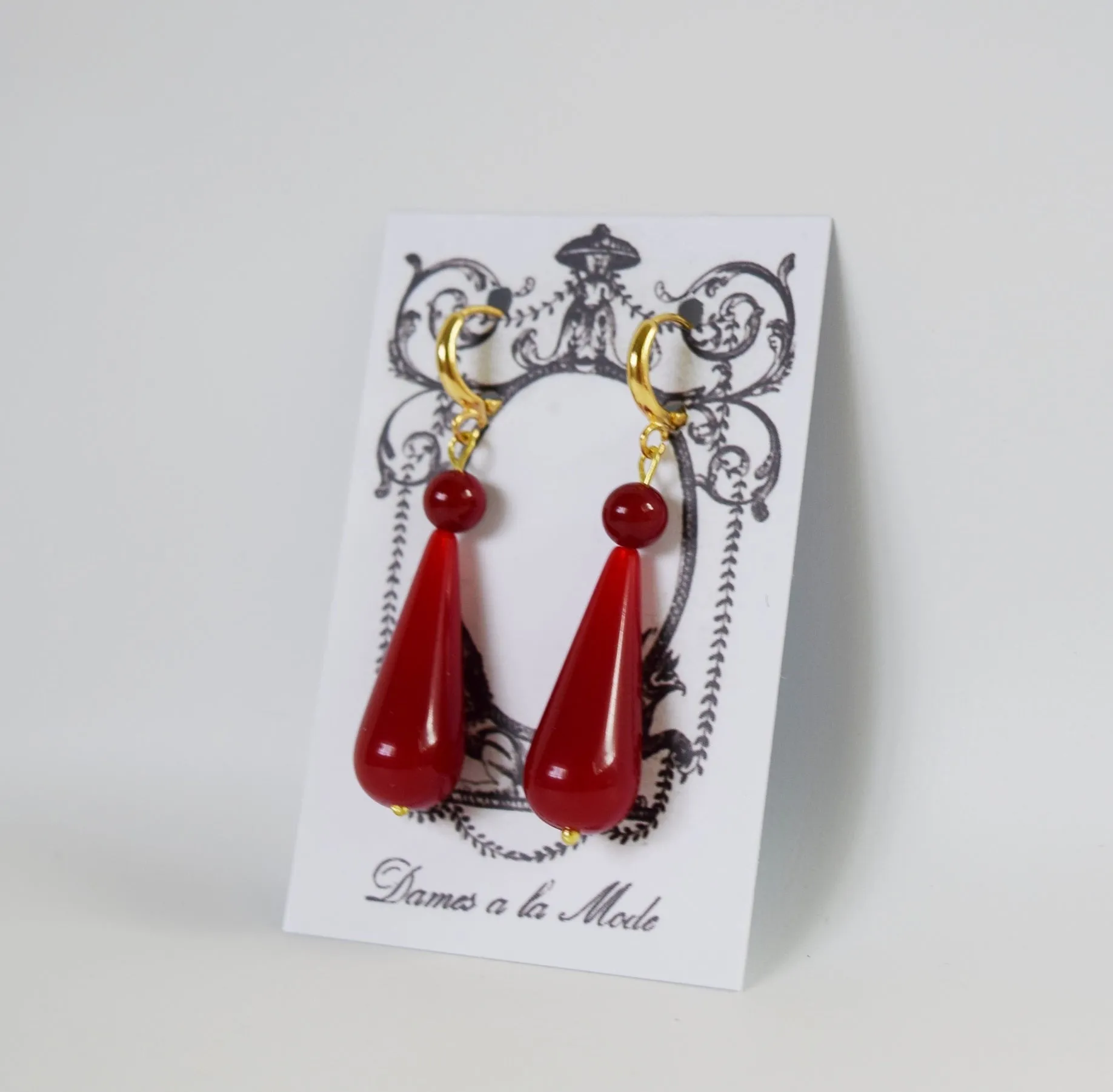 Elegant Coral Red Teardrop Earrings with Dual-Stone Design
