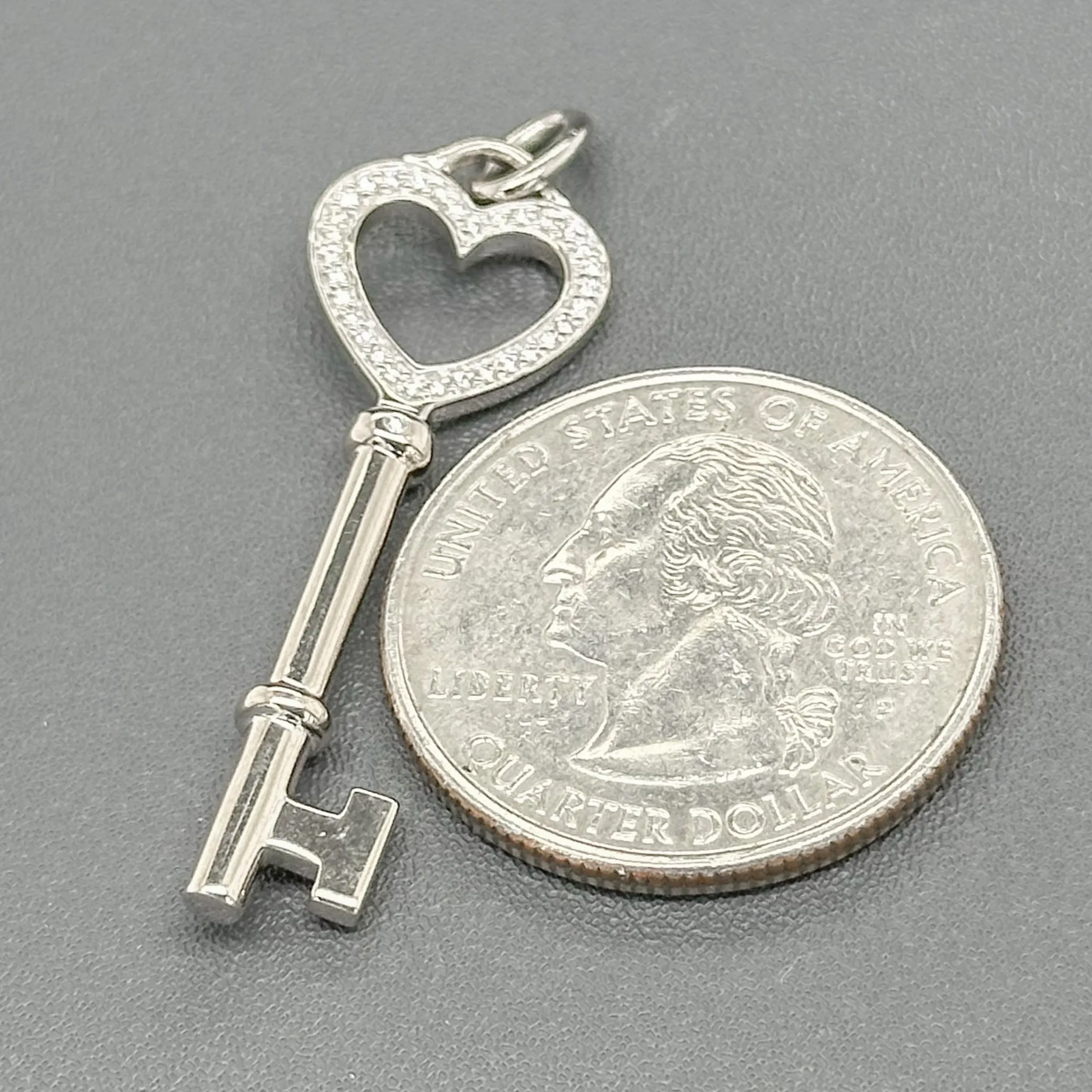 Estate Tiffany & Co. 18K W Gold Diamond Heart Key Pendant