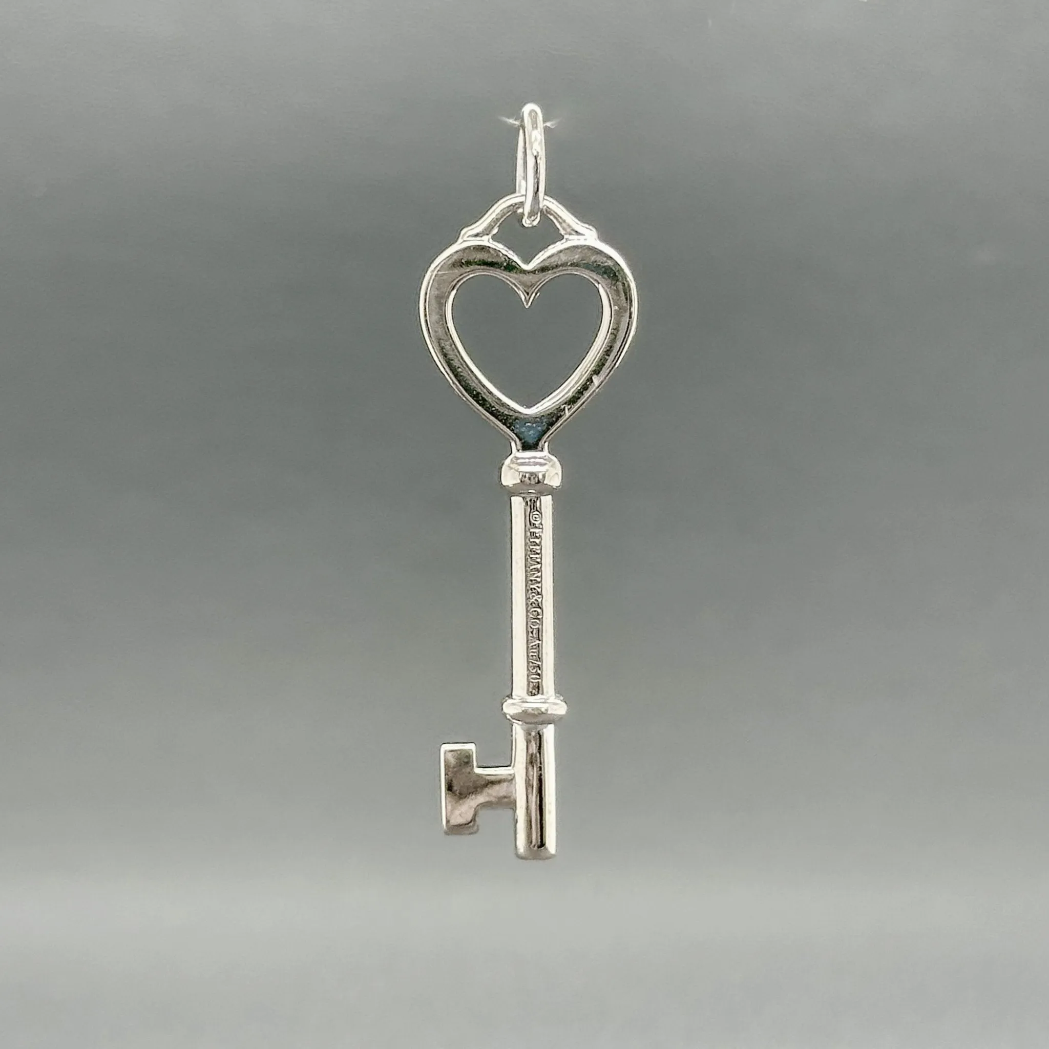 Estate Tiffany & Co. 18K W Gold Diamond Heart Key Pendant